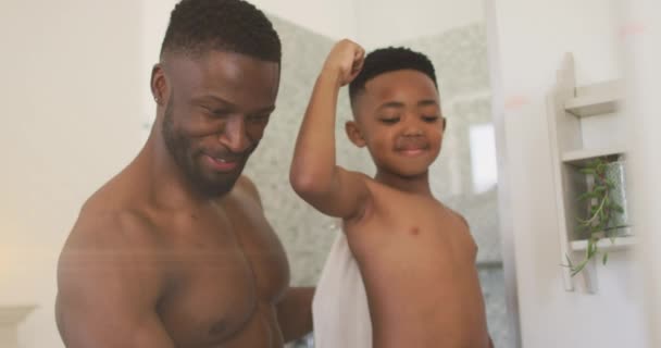 Animação Luzes Sobre Feliz Pai Filho Afro Americano Levando Selfie — Vídeo de Stock