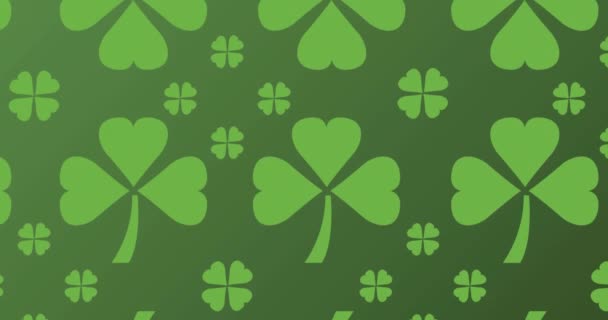 緑の背景に複数のクローバーの葉のアニメーションが動き出します Stパトリックの日のお祝いとアイルランドの伝統的なコンセプトデジタル生成されたビデオ — ストック動画