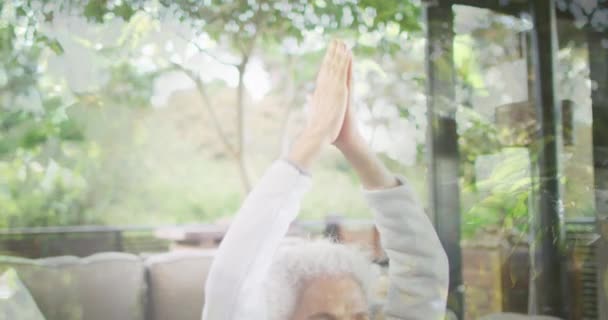 Animation Leaves Senior Caucasian Woman Practicing Yoga Meditating World Meditation — Stock Video