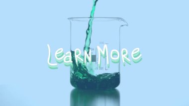 Animation of learn more over liquid pouring into glass. science, chemical experiments and education concept digitally generated video.