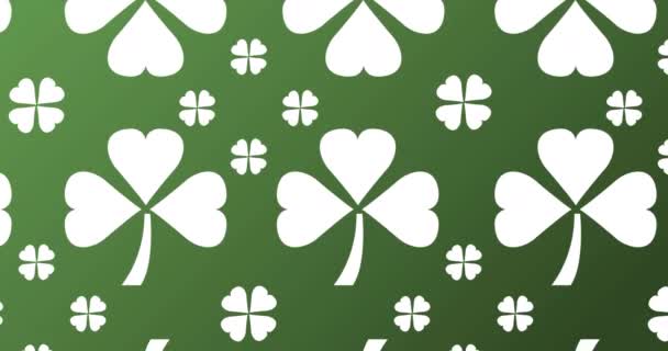 緑の背景に複数の白いクローバーの葉のアニメーション Stパトリックの日のお祝いとアイルランドの伝統的なコンセプトデジタル生成されたビデオ — ストック動画