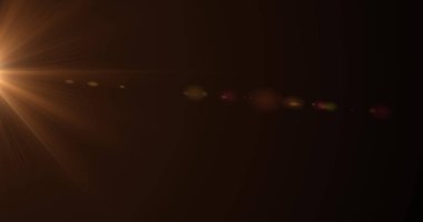 Kahverengi arka planda turuncu parlak ışık görüntüsü. Işık ve hareket kavramı dijital olarak oluşturuldu.