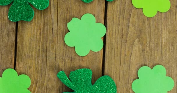Animation Multiple Clover Leaves Wooden Background Patrick Day Celebration Irish — Stock Video