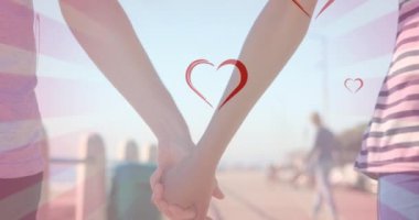 Çeşitli çiftlerin el ele tutuşarak kalplerinin düşüşünün canlandırması. moda ve yaşam tarzı konsepti dijital olarak oluşturulmuş video.