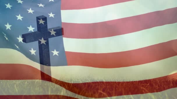 ウサの旗を振りながらキリスト教の十字架と草のアニメーション キリスト教 アメリカの愛国心の概念をデジタルで生成したビデオ — ストック動画