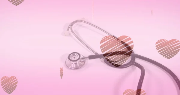 Kuva Sydämistä Jotka Putoavat Stetoskoopin Päälle Vaaleanpunaisella Taustalla Lääketieteen Terveydenhuollon — kuvapankkivalokuva