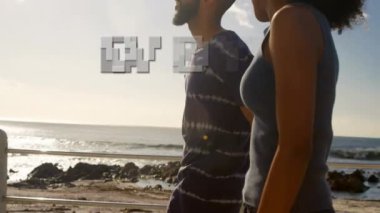 Afrika kökenli Amerikalı bir çiftin plajdaki animasyonu. Sosyal medya ve dijital arayüz kavramı dijital olarak oluşturulmuş video.