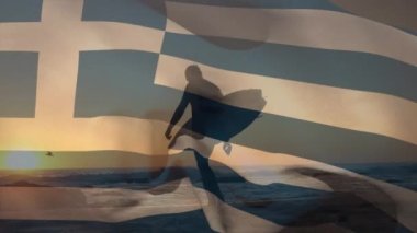 Yunan bayrağının sahildeki beyaz adam üzerinde canlandırılması. Vatanseverlik ve kutlama konsepti dijital olarak oluşturulmuş video.