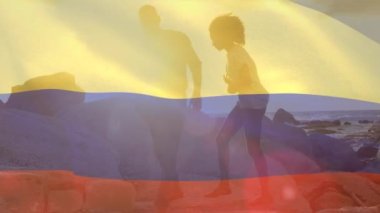 Sahildeki Afro-Amerikan çifti yerine Kolombiya bayrağının canlandırılması. Vatanseverlik ve kutlama konsepti dijital olarak oluşturulmuş video.