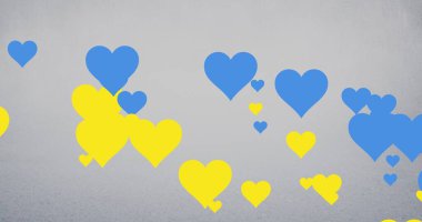 Gri arkaplandaki mavi ve sarı kalplerin bir kopyası. İllüstrasyon, vatanseverlik, Rusya Ukrayna çatışması, işgal ve pasifizm kavramı.