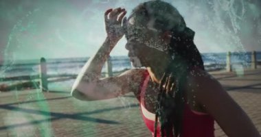 Yeşil dijital dalgalar yorgun Afrikalı Amerikalı sağlıklı kadınlara karşı gezinti alanında. spor ve spor konsepti