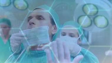 Kafkas kadın ve erkek cerrahların ameliyata hazırlanması üzerine altıgenlerin animasyonu. tıp ve sağlık hizmetleri kavramı dijital olarak üretilen video.