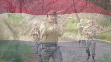 Zırhlı çeşitli askerlerin üzerinde Hollanda bayrağının canlandırılması. savaş, ordu, kamu savunması ve vatanseverlik kavramı dijital olarak oluşturulmuş video.