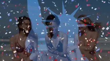 Sahildeki çeşitli bayan arkadaşlara karşı özgürlük heykeli ve konfeti animasyonu. Vatanseverlik ve kutlama konsepti dijital olarak oluşturulmuş video.