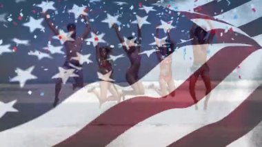 Amerikan bayrağı ve konfeti animasyonu sahildeki çeşitli arkadaşlara karşı. Vatanseverlik ve kutlama konsepti dijital olarak oluşturulmuş video.