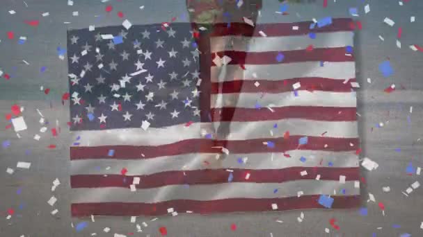 Animation American Flag Confetti African American Man Surfboard Beach Patriotism — Stock Video