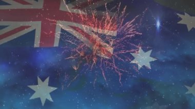 Avustralya bayrağının havai fişekler üzerinde dalgalanmasının animasyonu. Vatanseverlik ve kutlama konsepti dijital olarak oluşturulmuş video.
