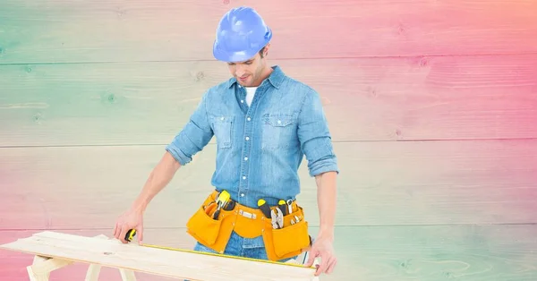 Male Worker Measuring Wooden Plan Copy Space Colorful Wooden Background — Stockfoto