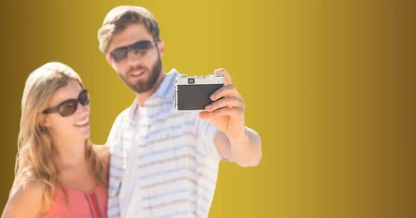 Caucasian Couple Taking Selfie Digital Camera Copy Space Yellow Background — Stock Photo, Image