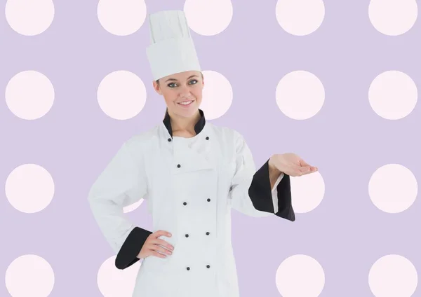 Chef Feminino Caucasiano Segurando Objeto Invisível Contra Bolinhas Padrão Pontos — Fotografia de Stock