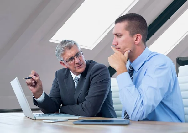 Two Caucasian Businessmen Discussing Laptop Office Background Business Technology Concept — Stock fotografie