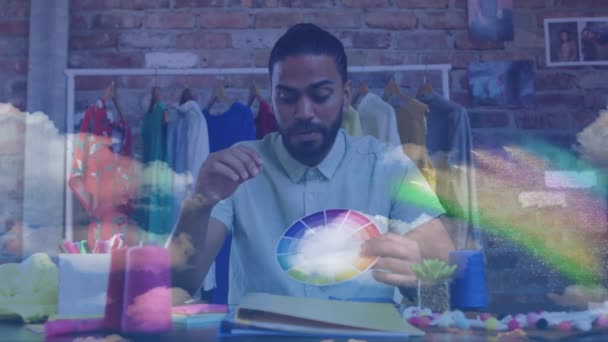 Rainbow Light Trails African American Male Fashion Designer Holding Color — стоковое видео