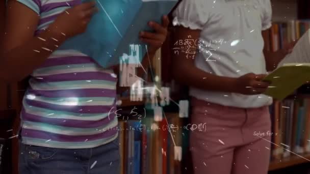 Mathematical Equations Floating Two African American Girls Reading Book Library — Stockvideo