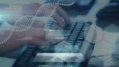 Klavyede yazan kişiye karşı veri işleme ve DNA yapısına sahip birden fazla ekran. tıbbi araştırma ve bilim teknolojisi kavramı