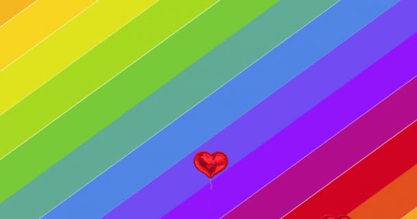 Animatie Van Vallende Harten Boven Regenboog Vlaggen Lgbtq Trots Gelijkheid — Stockvideo