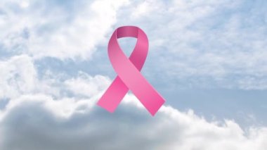Bulutlu gökyüzünde pembe kurdelenin animasyonu. Göğüs kanseri pozitif farkındalık kampanyası konsepti dijital olarak üretildi.