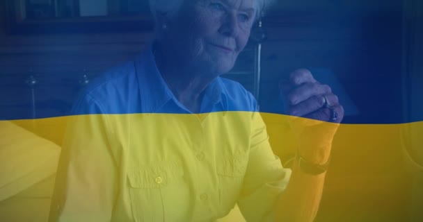 Animation Flag Ukraine Senior Caucasian Woman Crying Ukraine Crisis International — Vídeos de Stock