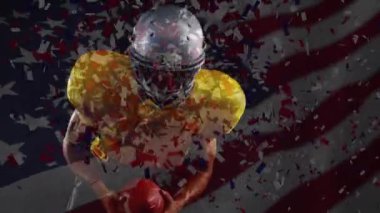 Amerikan futbolcusu üzerinde ABD bayrağı sallama ve conffeti animasyonu. küresel spor ve yarışma konsepti dijital olarak oluşturulmuş video.
