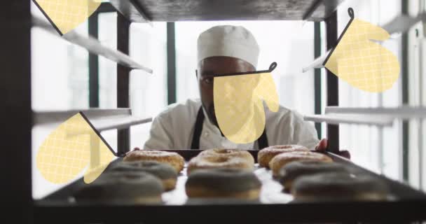 Animation Oven Glove Icons African American Male Baker Preparing Donuts — ストック動画