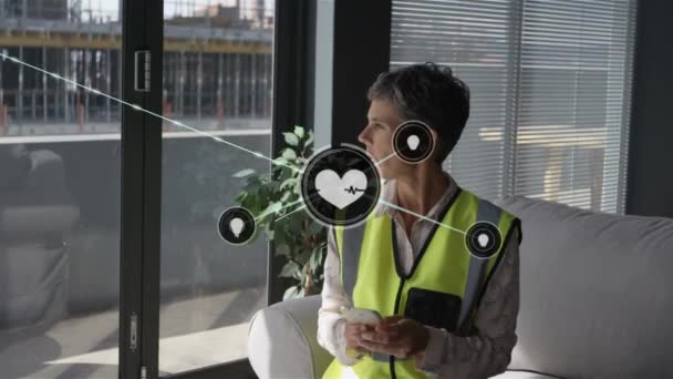 Animation Network Connected Heart Icons Caucasian Woman High Vis Vest — Stock Video