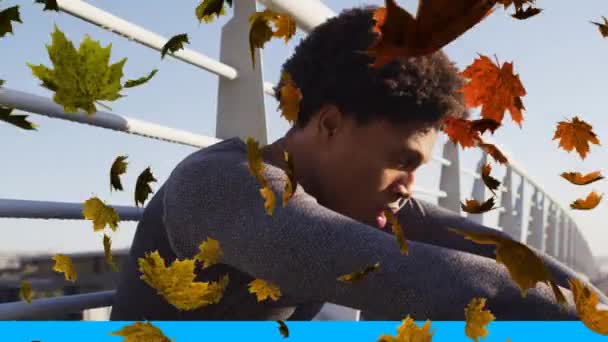 Multiple Leaves Icon Falling African American Man Taking Break Running — Video