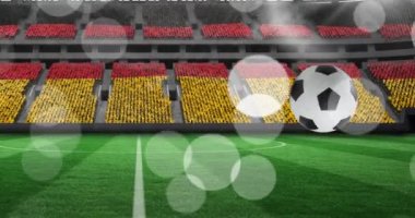 Stadyumun üzerinde Alman bayrağı taşıyan futbol toplarının animasyonu. Spor, rekabet ve zafer konsepti dijital olarak oluşturulmuş video.