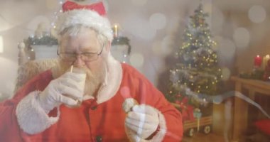 Noel Baba 'nın Noel' de süt içmesi üzerine ışıklı noktaların canlandırılması. dünya süt günü ve noel konsepti dijital olarak oluşturulmuş video.