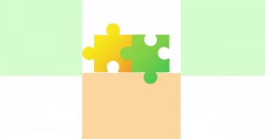 Hareket eden karelerle arkaplanda renkli bulmacaların canlandırılması. Ulusal bulmaca günü ve düşünme konsepti dijital olarak oluşturulmuş video.