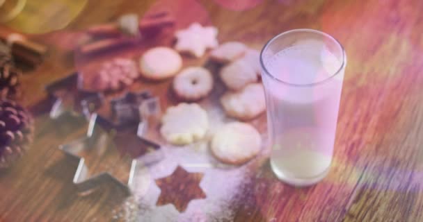 Animatie Van Lichte Vlekken Melk Koekjes Met Kerst Wereld Melk — Stockvideo