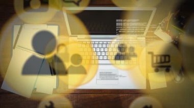 Masasında kopya alanı olan dizüstü bilgisayarın üzerindeki simgelerin animasyonu. veri işleme, iş, ağ ve teknoloji konsepti dijital olarak oluşturulmuş video.