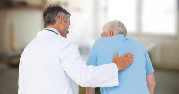 Rear View Caucasian Mature Male Doctor Assisting Senior Man Walking — Fotografia de Stock