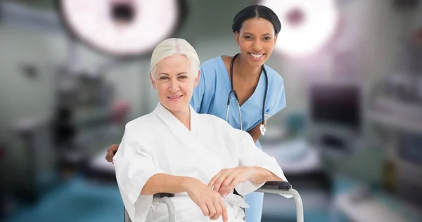 Portrait Multiracial Smiling Young Doctor Senior Woman Sitting Wheelchair Hospital — Foto de Stock