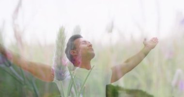 Manzaraya kollarını açmış beyaz bir adamın animasyonu. Asla günden vazgeçme ve dijital olarak üretilen video konseptini kutla.