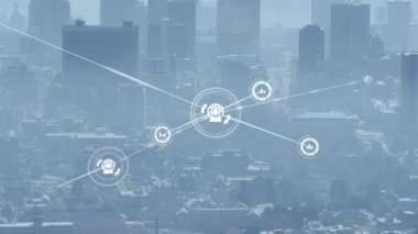Animation of network of connections with icons over cityscape. global connections and technology concept digitally generated video.