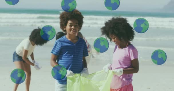 Animation Globes Happy African American Family Picking Waste Sunny Beach — Stock video