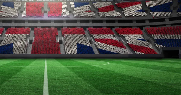 Image of gold confetti falling over flag of united kingdom in sports stadium. competition, sports and competition concept digitally generated image.