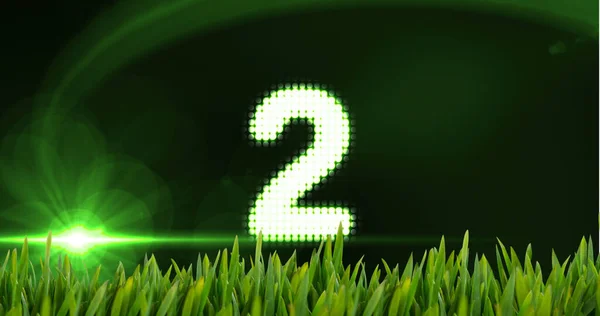 Animierter Countdown Mit Licht Und Gras Vor Digitalem Animierten Hintergrund — Stockfoto