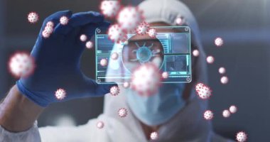 Animation of virus cells over caucasian male lab worker with sample. animation of virus cells and pandemic total confirmed over globe and navy background.