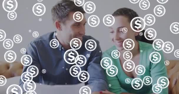 Animation Dollar Symbols Diverse Couple Doing Paperwork Tax Day Celebartion — Vídeos de Stock
