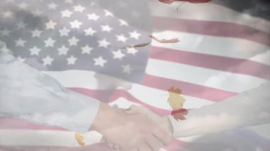 ABD bayrağı üzerinde el sıkışma ve yaprakların canlandırılması. Vatanseverlik ve kutlama konsepti dijital olarak oluşturulmuş video.